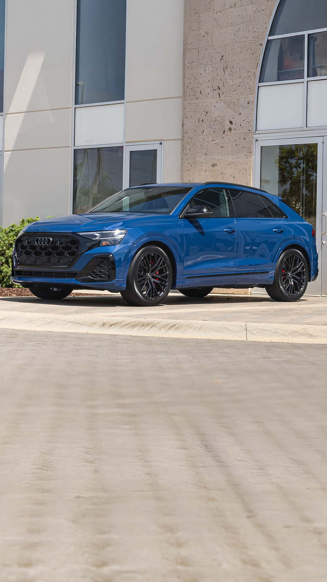 Right profile view of an Audi vehicle parked.